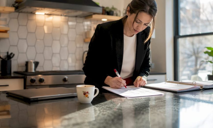 Event planner reviewing catering checklist